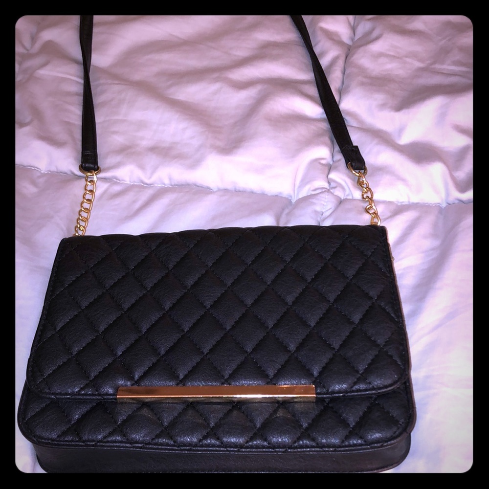 Brand new black purse with gold chain
